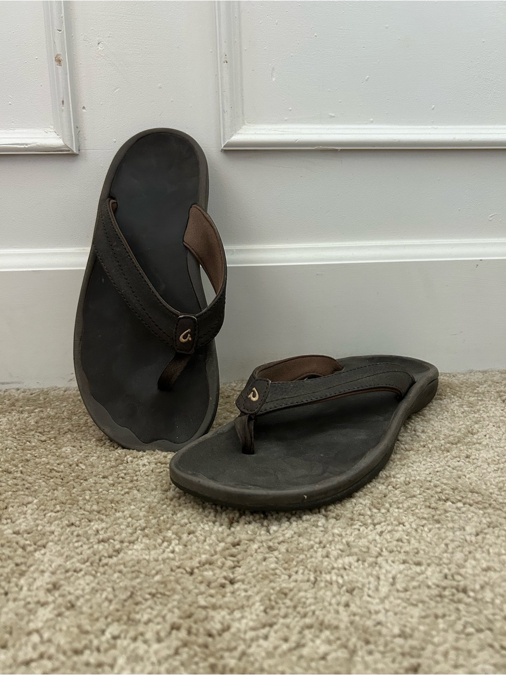OluKai flip flops